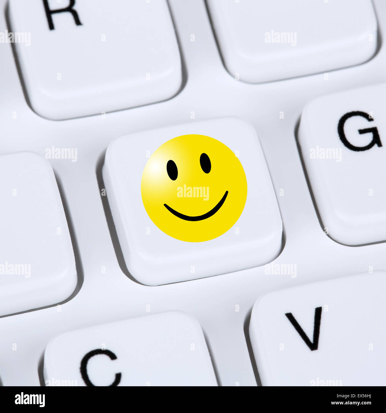 Computer concept heureux symboles smiley Commentaires Évaluation de la qualité de service sur le clavier Banque D'Images