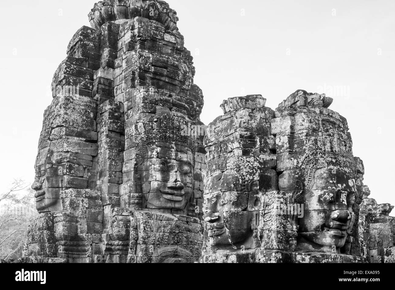 L'Asie, Cambodge, Siem Reap, sculptures sur pierre de la 12e siècle roi bouddhiste Jayavarman VII au temple Bayon à Angkor Wat Banque D'Images