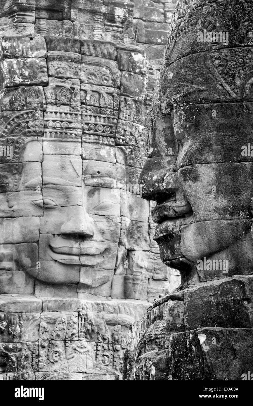 L'Asie, Cambodge, Siem Reap, sculptures sur pierre de la 12e siècle roi bouddhiste Jayavarman VII au temple Bayon à Angkor Wat Banque D'Images