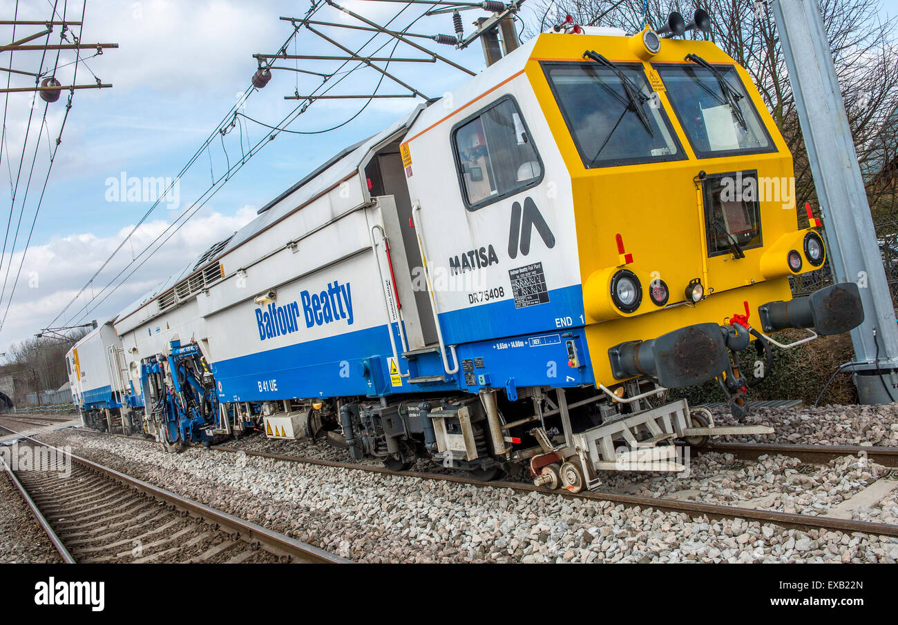 Balfour Beatty falsifier travaillant sur la voie de chemin de fer en Angleterre. Banque D'Images