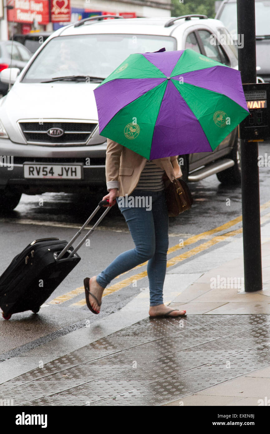 Wimbledon London,UK. 13 juillet 2015. La pluie arrive enfin à la fin de l'année 2015, championnats de tennis de Wimbledon qui avait connu une saison chaude et une vague de chaleur pendant la quinzaine de Wimbledon : Crédit amer ghazzal/Alamy Live News Banque D'Images