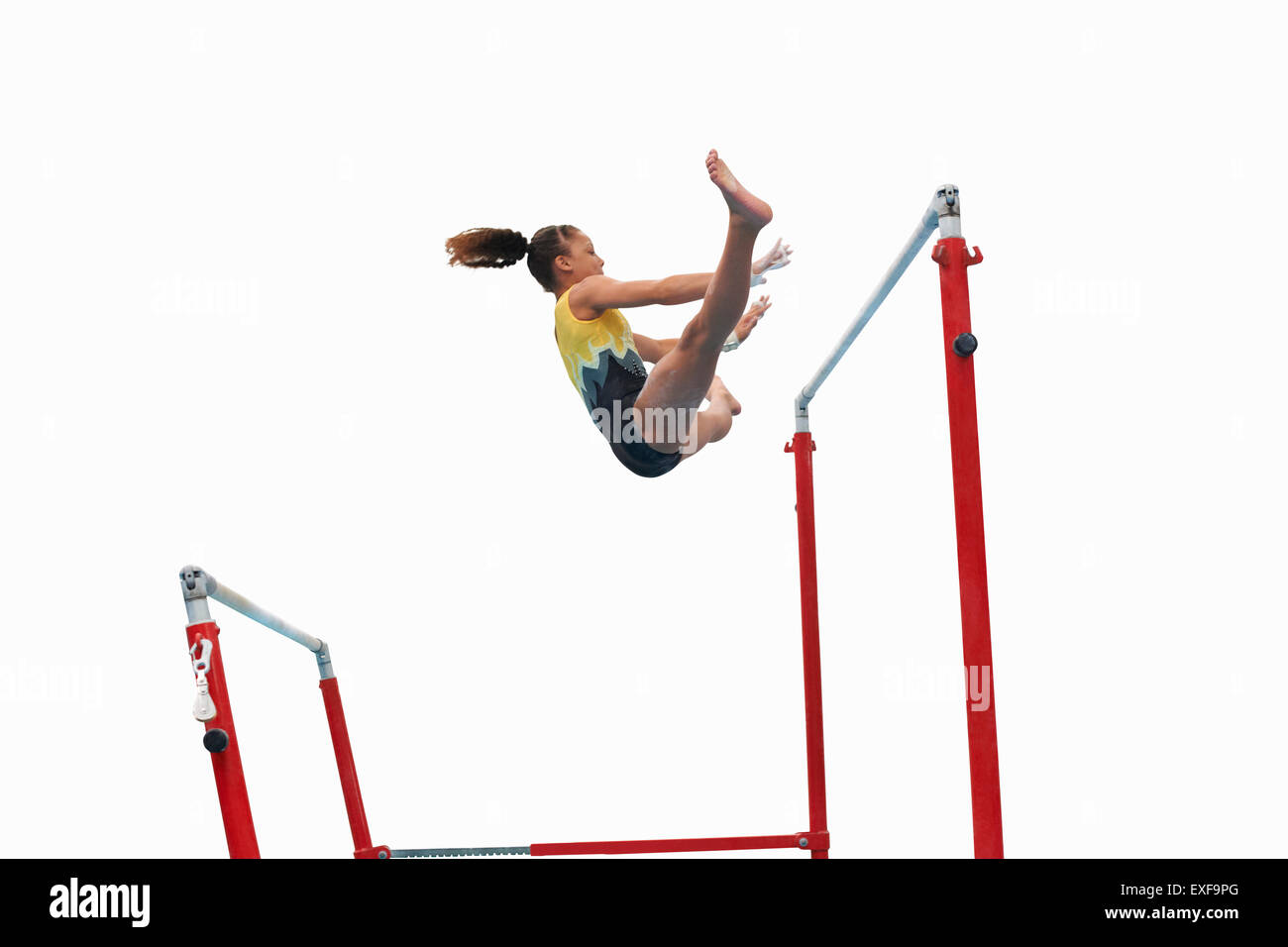 Young gymnast sur barres asymétriques Banque D'Images