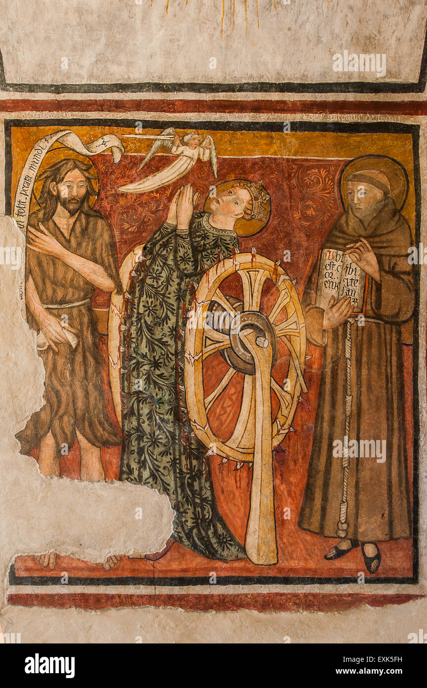 Italie Piémont langhe Patrimoine de Serralunga d'alba le Frescoede château Chapelle XV siècle-de gauche Saint Jean-Baptiste, Sainte Catherine d'alexandrie (avec double roue dentée) et St Antony Banque D'Images