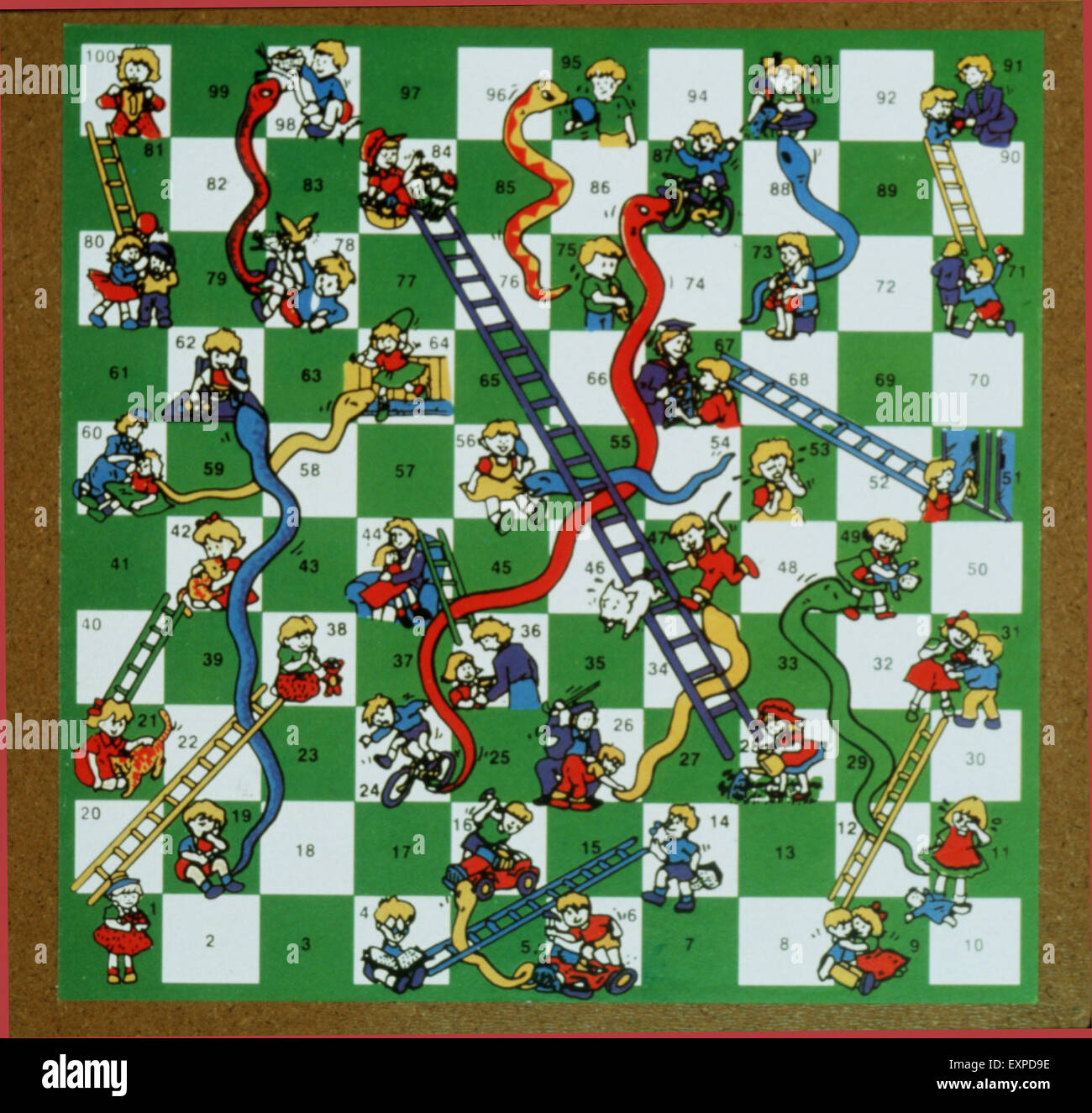 1990 UK Plaque Magazine Serpents et échelles Banque D'Images