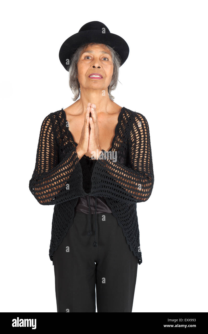 Belle femme faisant des expressions différentes dans différents ensembles de vêtements : prier Banque D'Images