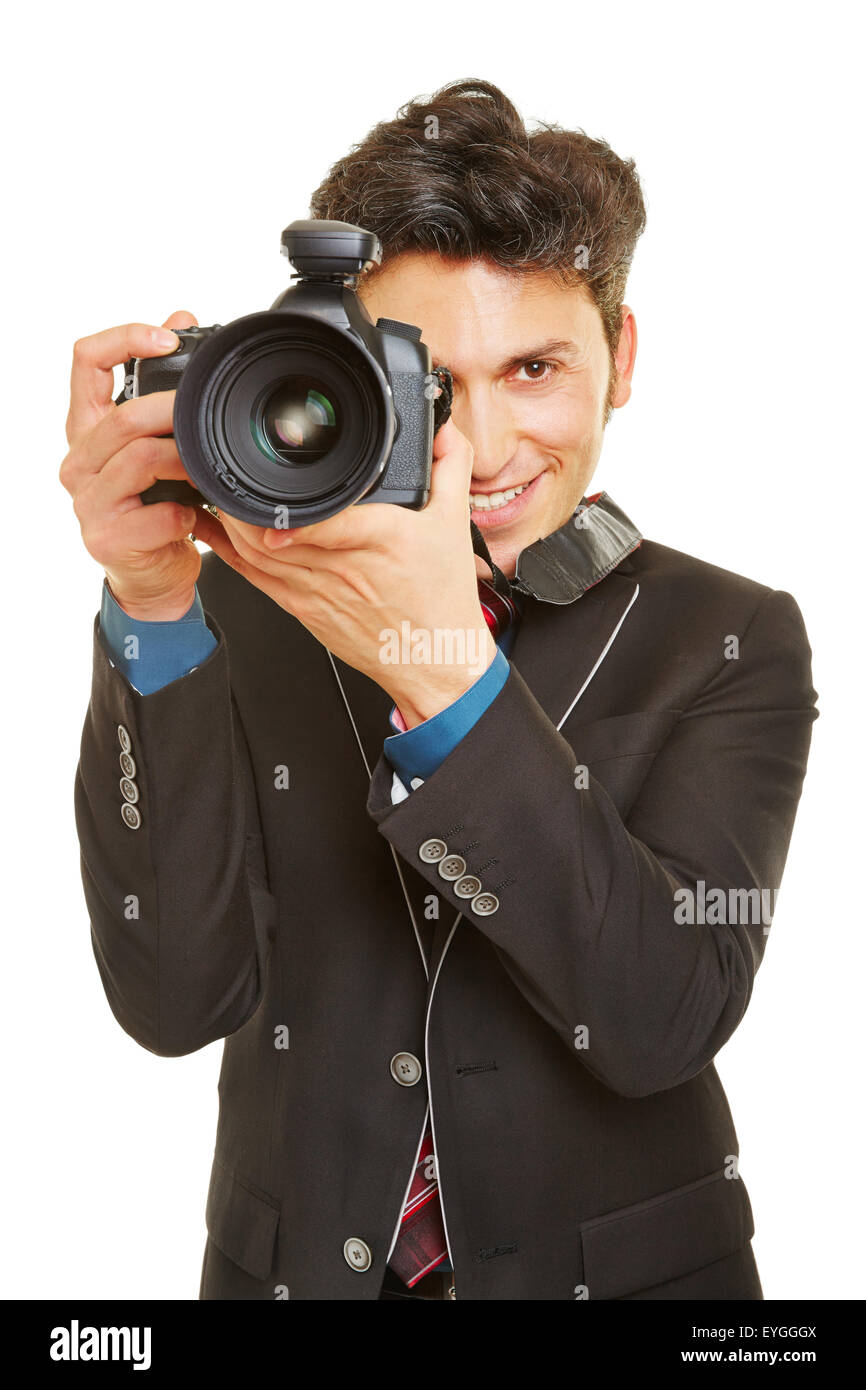 Photographe mariage souriant avec appareil photo numérique moderne Banque D'Images
