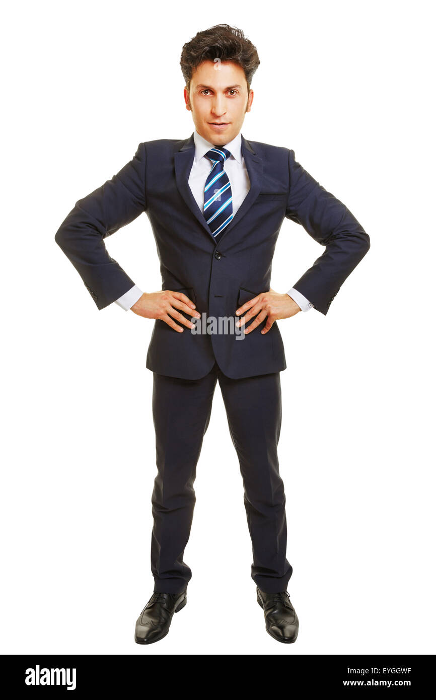 Successful business manager avec ses bras akimbo Banque D'Images