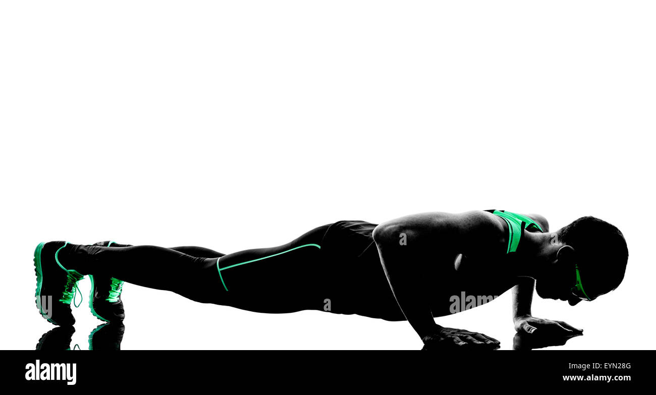 Un homme l'exercice de remise en forme silhouette push ups en isolé sur fond blanc Banque D'Images
