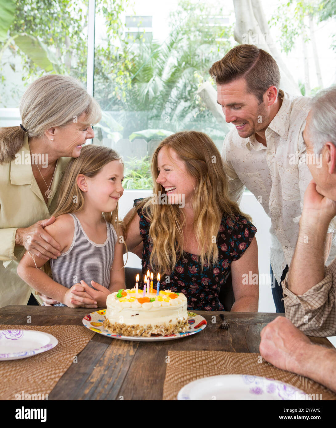 Caucasian family celebrating birthday at table Banque D'Images