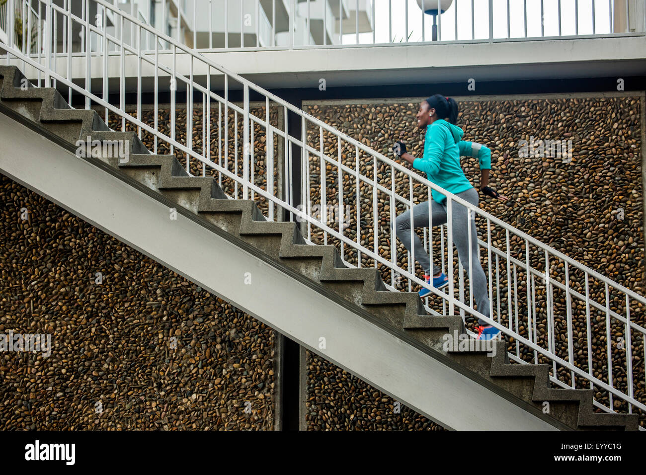 Black runner escalier d'escalade Banque D'Images