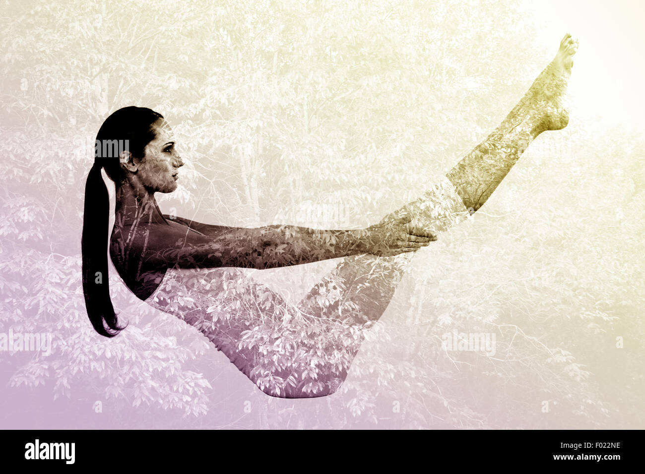 Image composite de tonique femme voile posent in fitness studio Banque D'Images