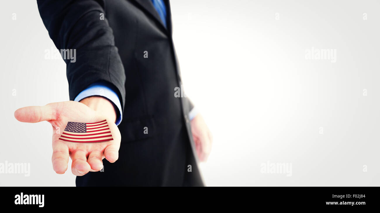 Composite image of businessman holding ses mains à l'appareil photo Banque D'Images