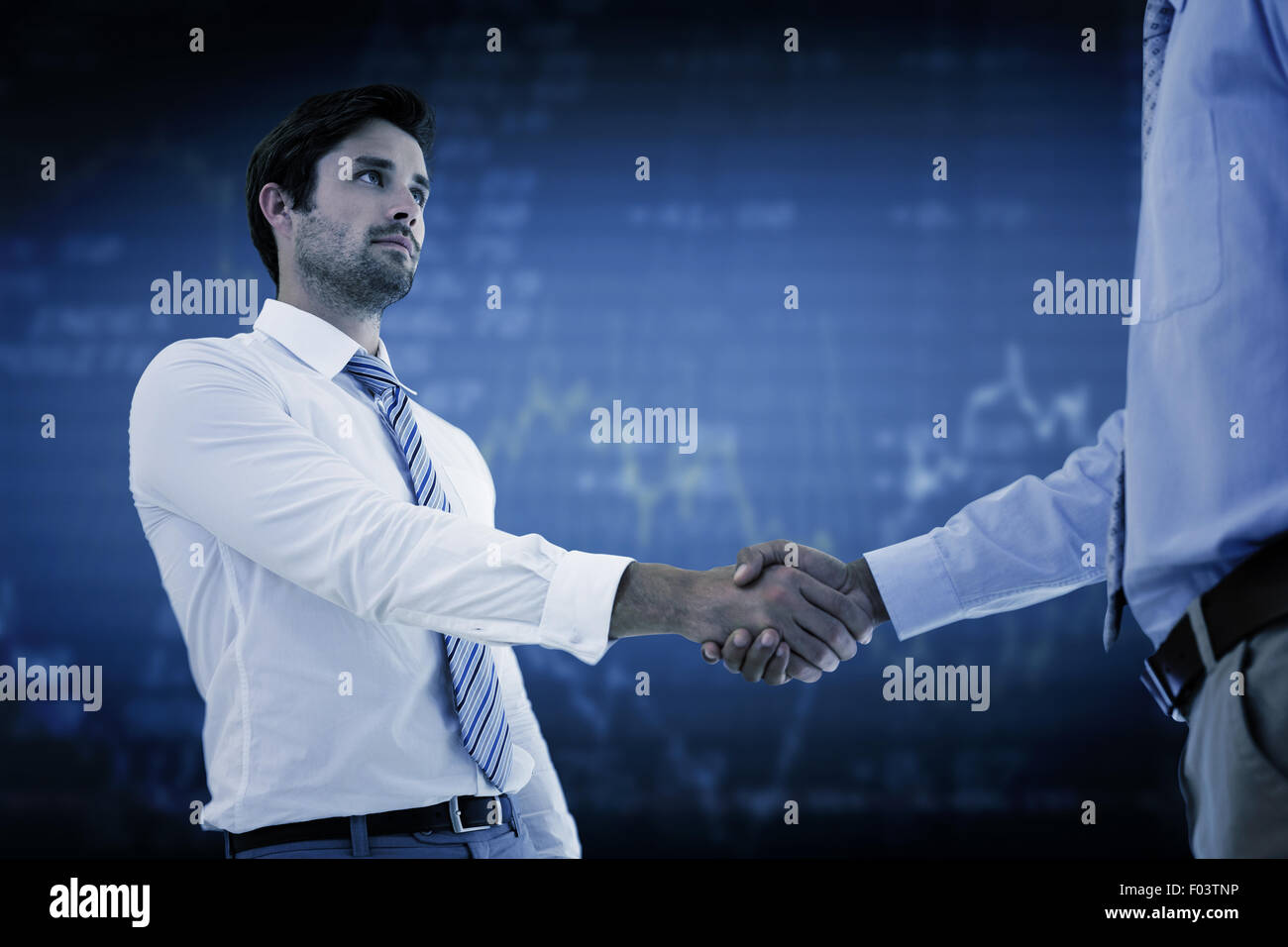 Image composite de deux businessmen shaking hands in office Banque D'Images