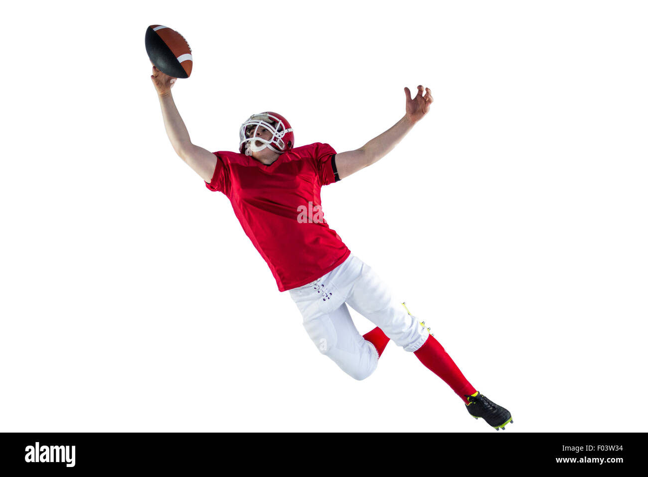 Joueur de football américain marquant un touchdown Banque D'Images