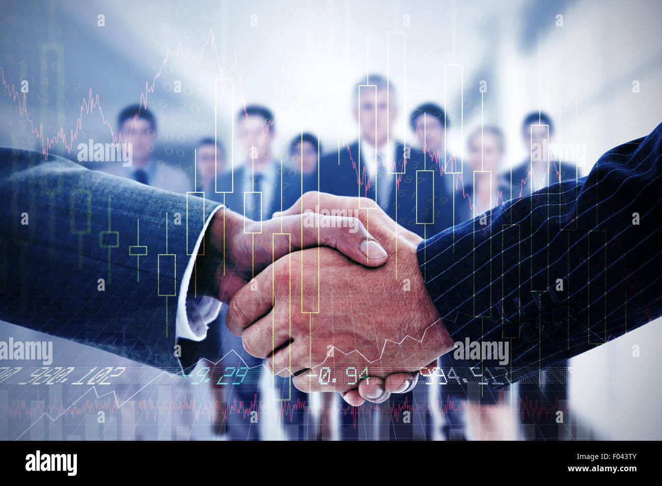 Image composite de business people shaking hands Banque D'Images