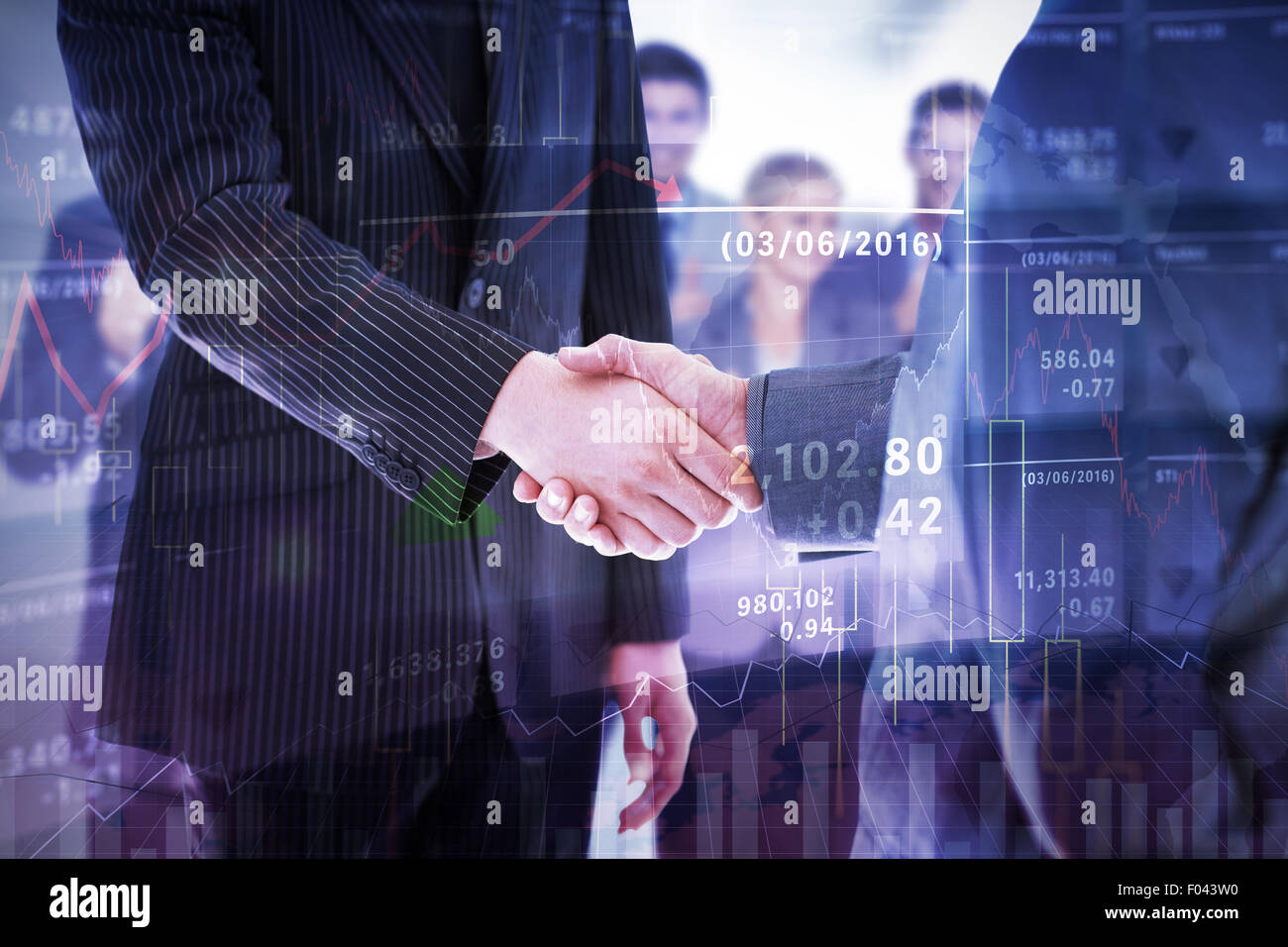 Image composite de business people shaking hands Banque D'Images