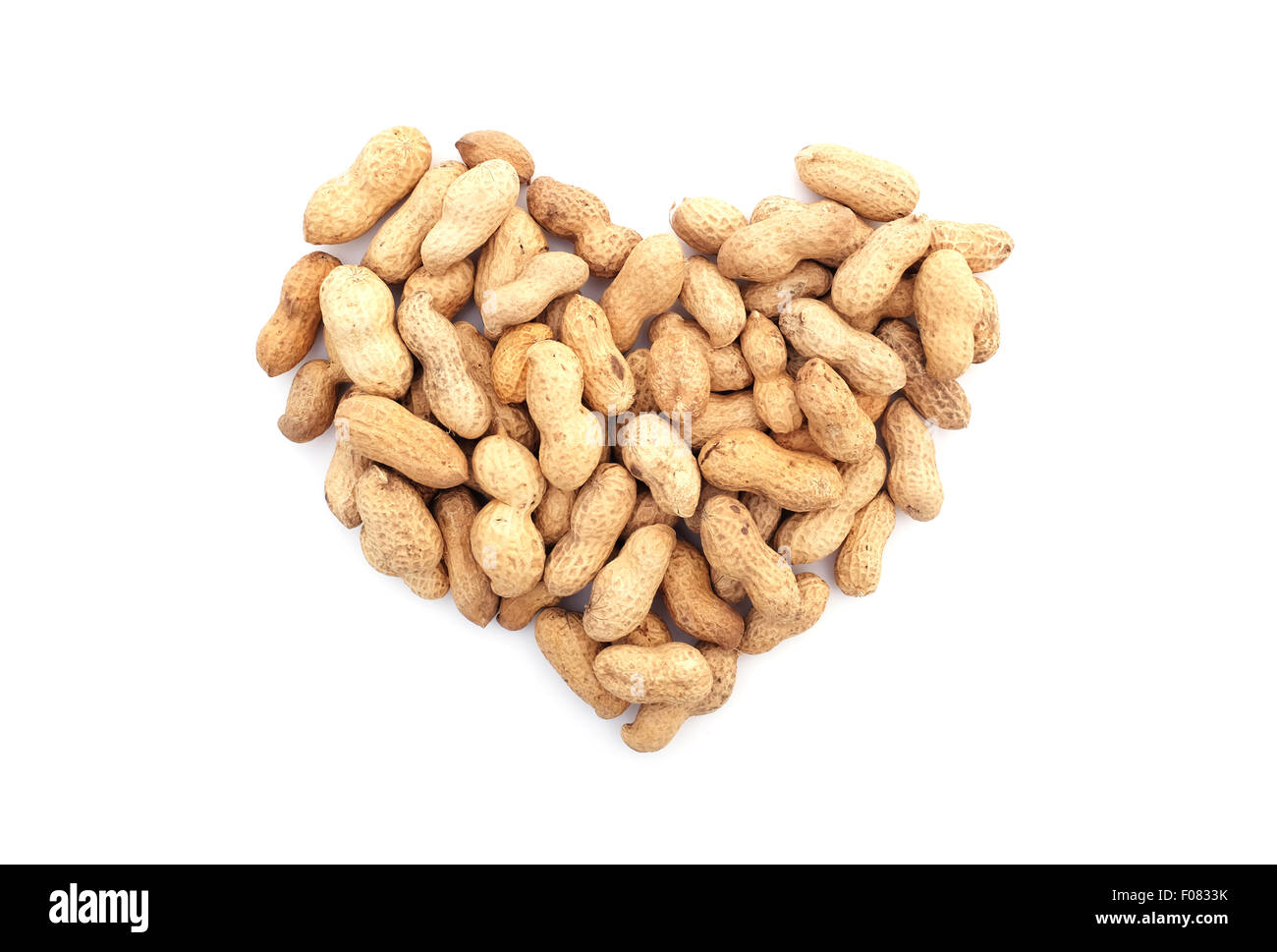 Les écrous de singe en forme de coeur, isolé sur fond blanc Banque D'Images