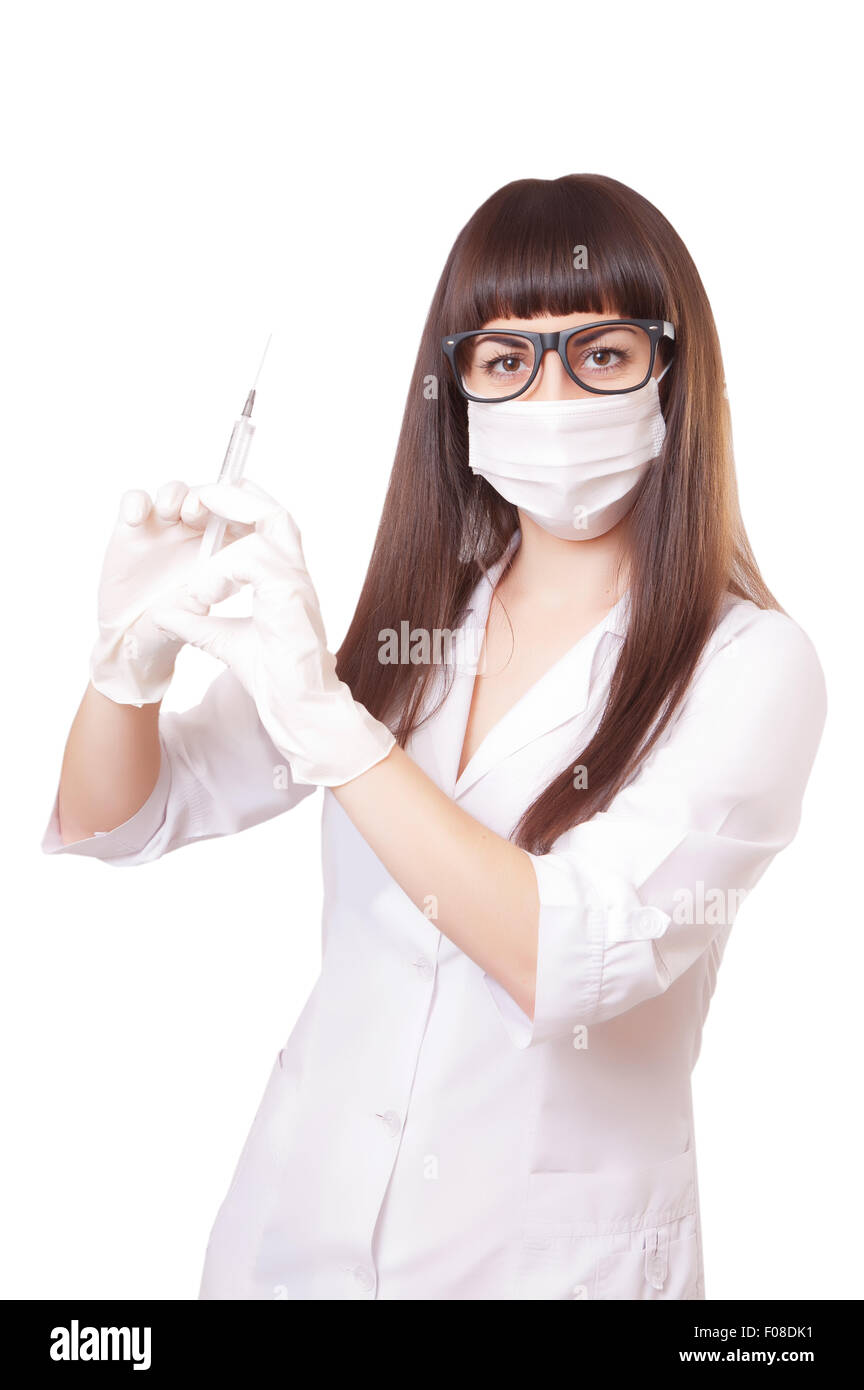 Belle jeune docteur en robe médical holding syringe, isolated on white Banque D'Images