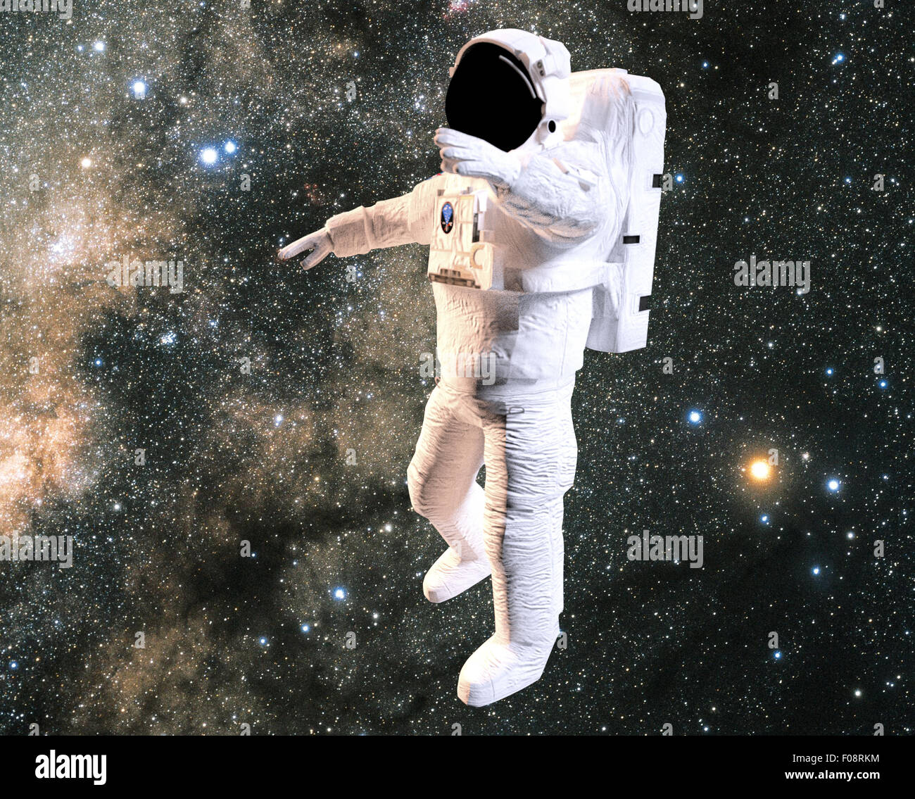 Astronaute en combinaison spatiale. Éléments de cette image fournie par la Nasa, l'astronaute dans l'espace blanc costume dans l'univers Banque D'Images