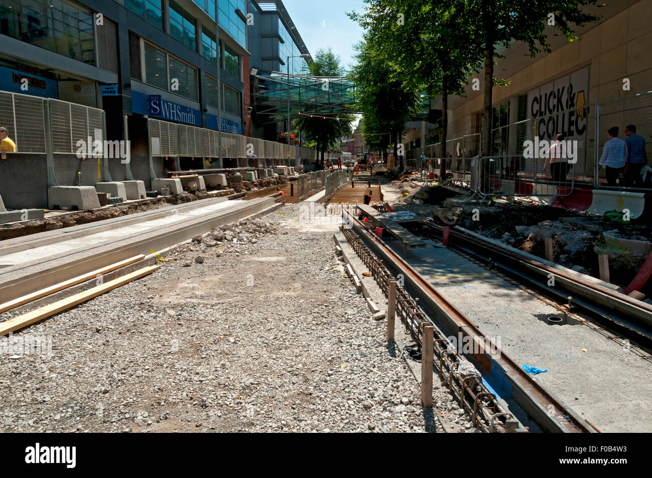 Travaux de construction de la voie de tramway Metrolink, Corporation Street, Manchester, Angleterre, RU Banque D'Images