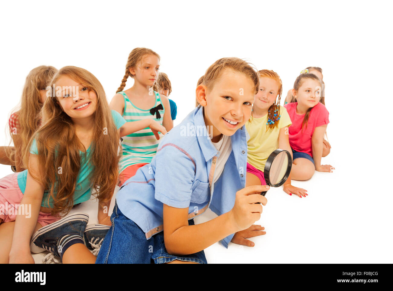 Recherche garçon loupe et amis Banque D'Images