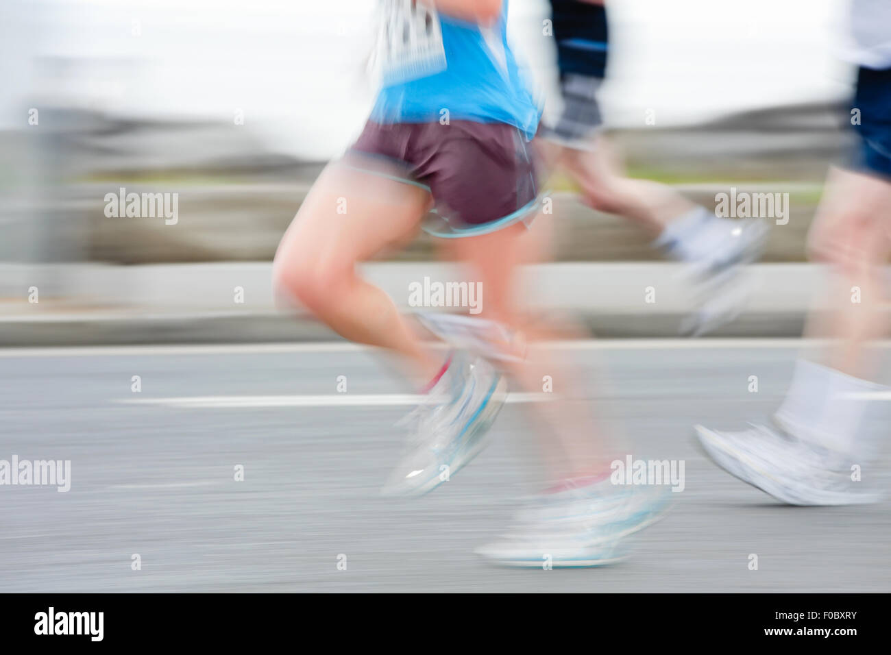 Groupe de coureurs en compétition dans la course, blurred motion. Les gens ne sont pas reconnaissables Banque D'Images
