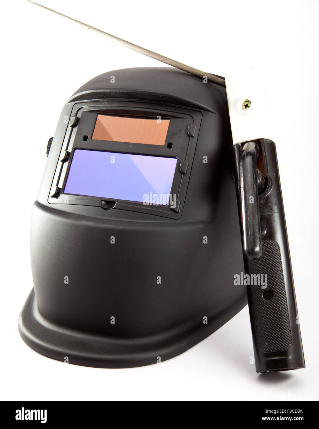 Masque de protection du soudeur, électrodes et des gants sur fond blanc Banque D'Images