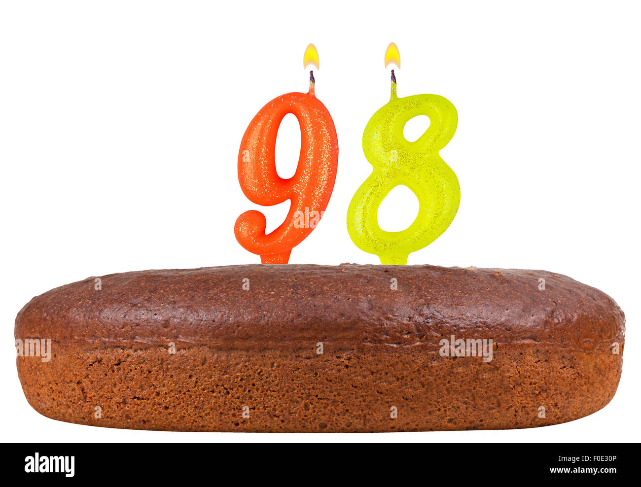 Les bougies du gâteau d'anniversaire numéro 98 isolated Banque D'Images