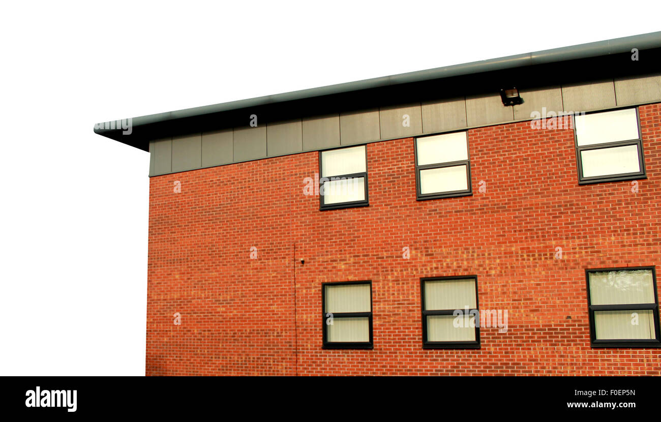 Bureau extérieur de l'immeuble moderne sur fond blanc avec l'exemplaire de l'espace. Banque D'Images