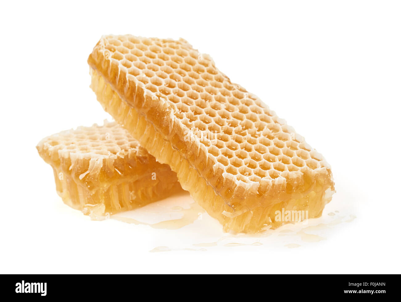 Deux morceaux de matières honeycomb isolated on white Banque D'Images