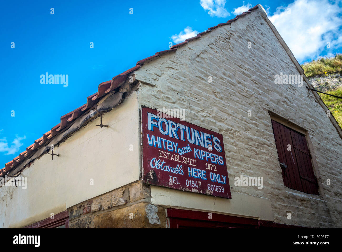 La fortune des harengs Whitby guéri signe sur des capacités, Whitby, North Yorkshire, UK. Banque D'Images