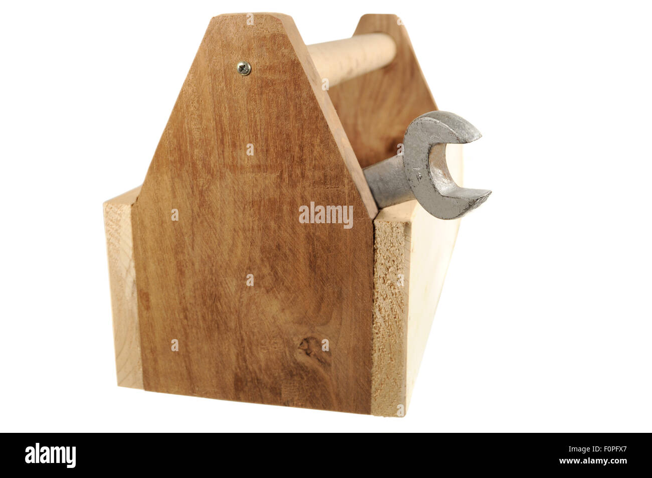 La boîte à outils en bois avec une clé isolé sur fond blanc Banque D'Images