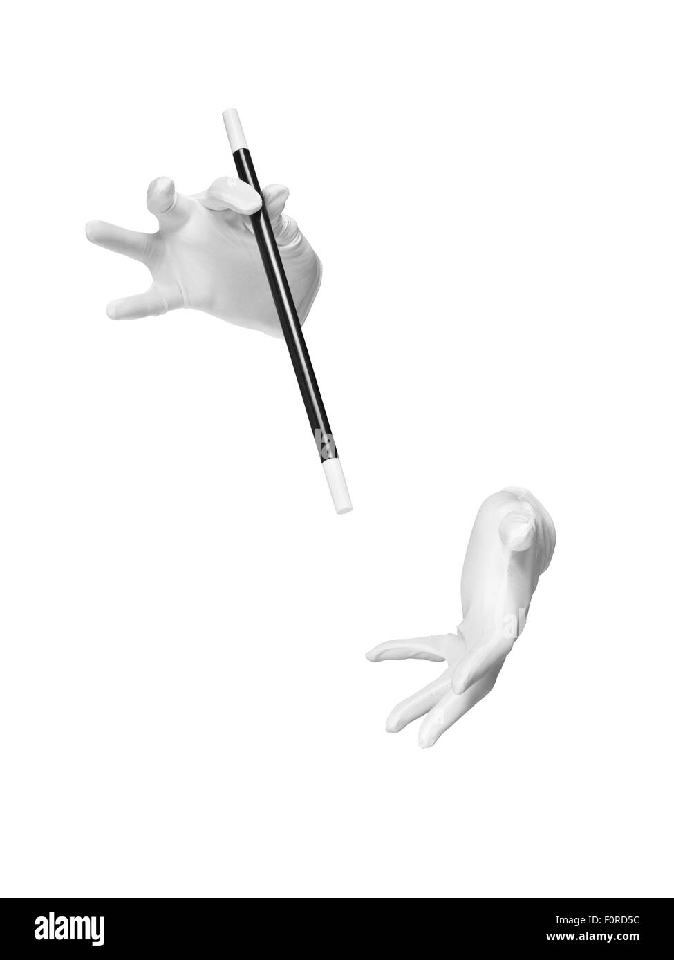 Shot de magiciens invisibles mains gantées avec une baguette magique pendant l'exécution d'un truc ou illusion isolé Banque D'Images