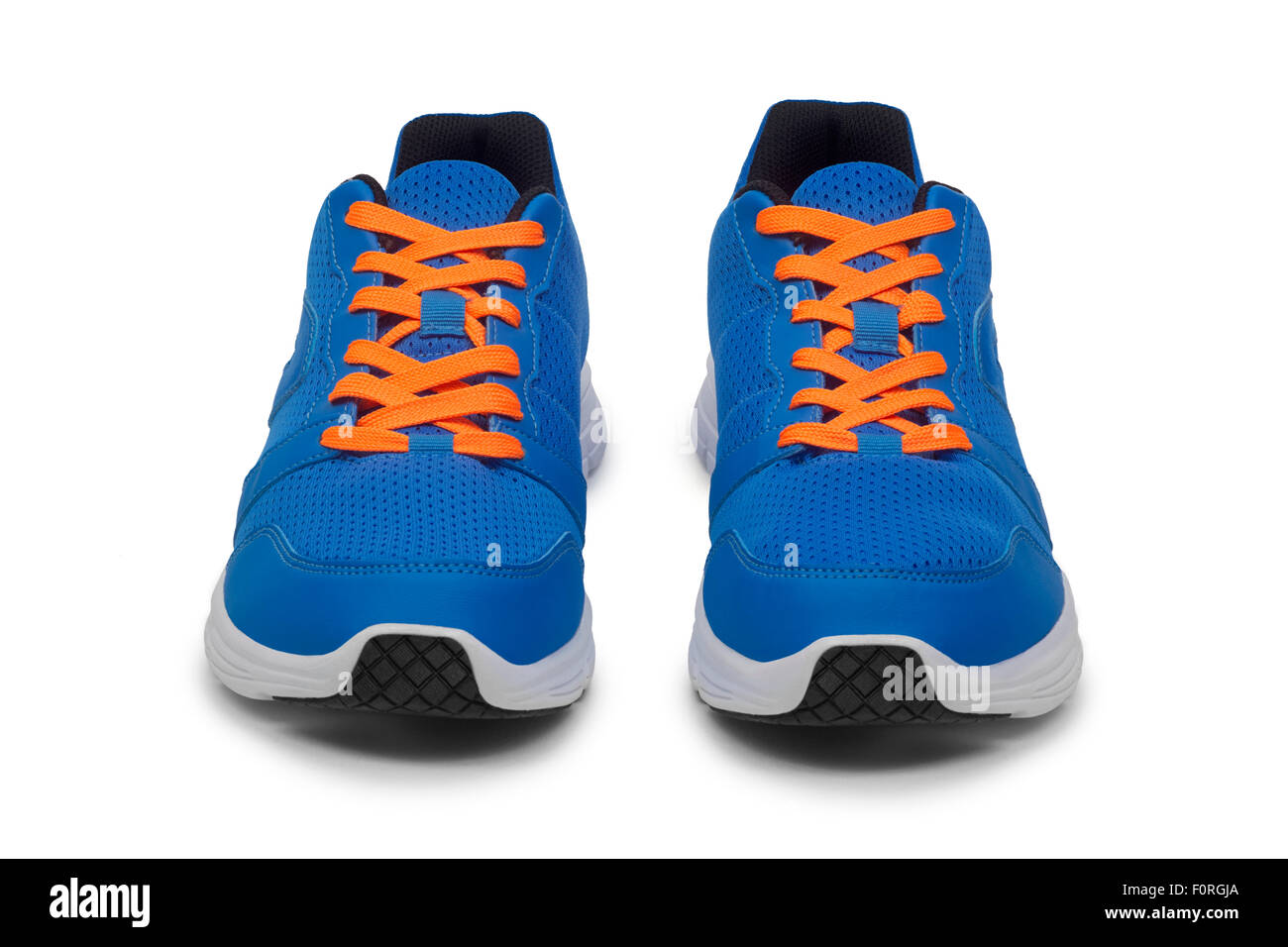 Des chaussures de course photographiés dans le studio sur un fond blanc. Chaussures de course photographiées en studio sur fond blanc. Banque D'Images