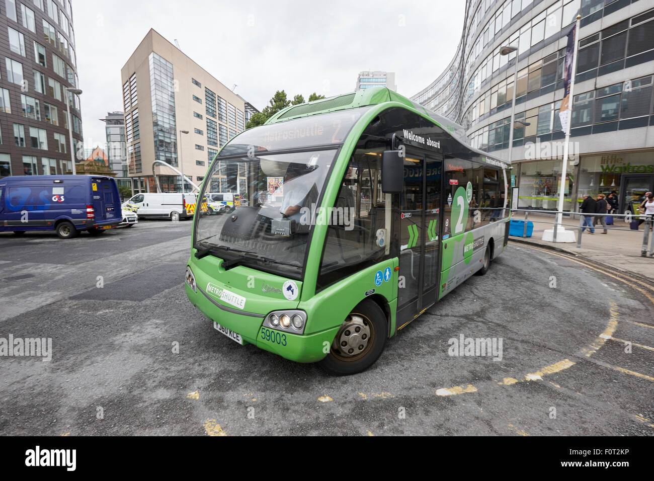 Navette métro bus électrique libre service dans le centre-ville de Manchester England UK Banque D'Images
