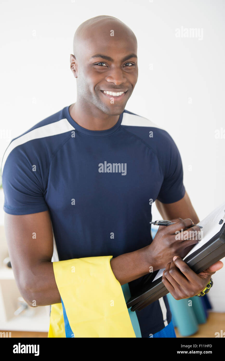 Trainer noir notes in yoga studio Banque D'Images
