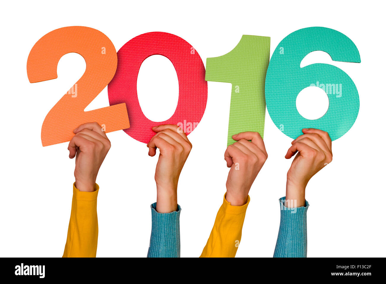 Les mains avec numéros de couleur indique l'année 2016. Isolé sur fond blanc Banque D'Images