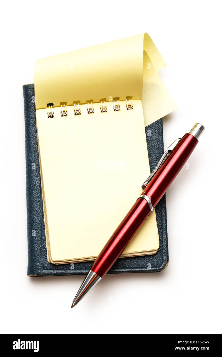 Ouvrez le bloc-notes en blanc jaune avec stylo rouge Banque D'Images