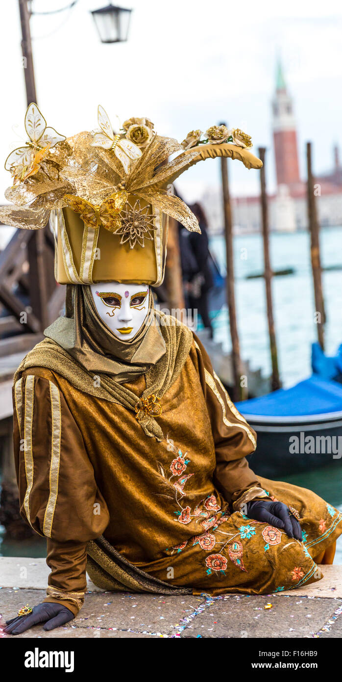 Trouver de l'or au costume Carnaval de Venise Banque D'Images