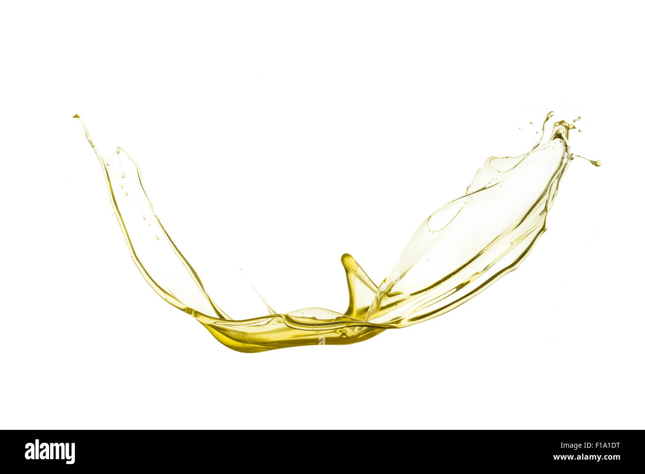 Flying splash liquide jaune sur fond blanc Banque D'Images