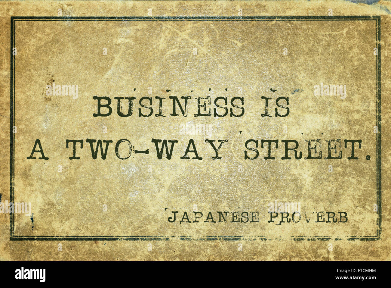 Entreprise est une rue à double sens - ancien proverbe japonais imprimé sur carton vintage grunge Banque D'Images