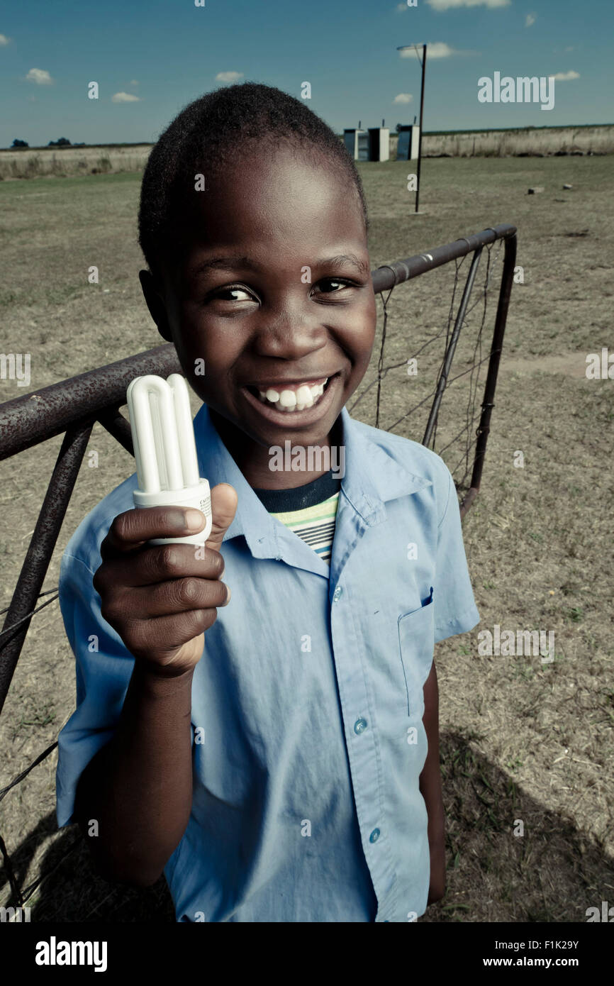 African Male student standing outside, smiling at camera Banque D'Images