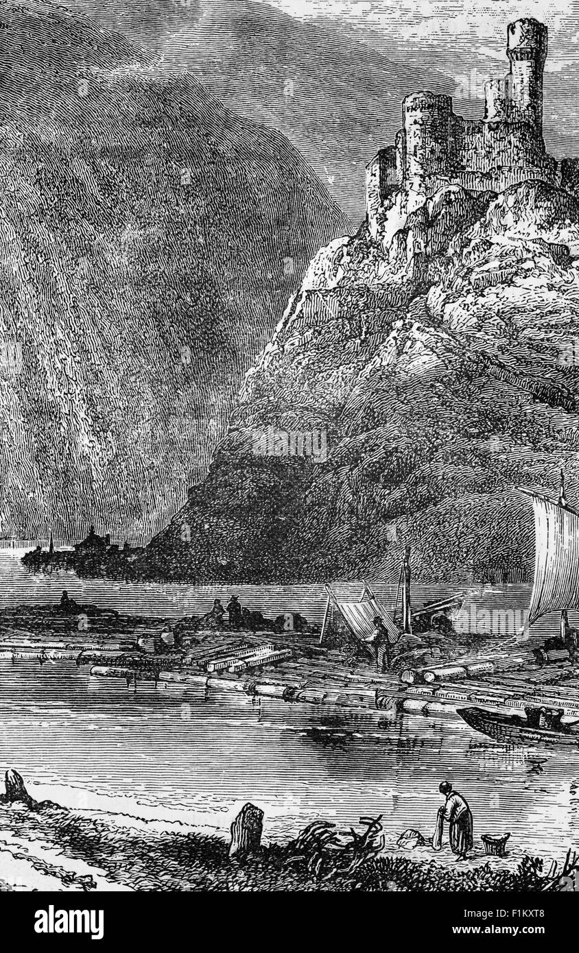 Vue du XIXe siècle d'un radeau flottant le long de la vallée du Rhin, au-dessous d'un ancien château près de Bingen am Rhein, une ville dans le district de Mayence-Bingen en Rhénanie-Palatinat, en Allemagne. Banque D'Images