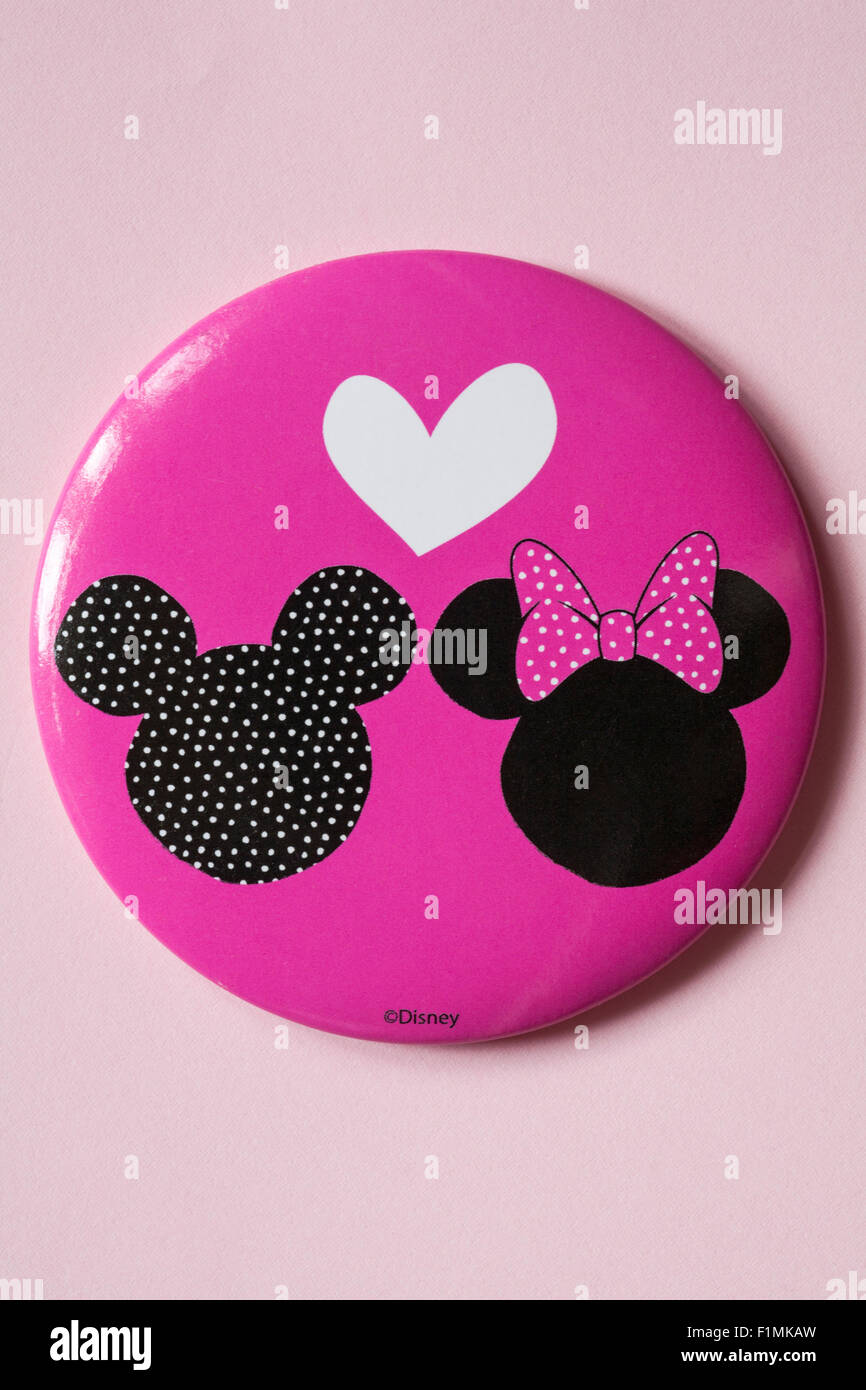 Disney Mickey & Minnie Miroir isolé sur fond rose pale Banque D'Images