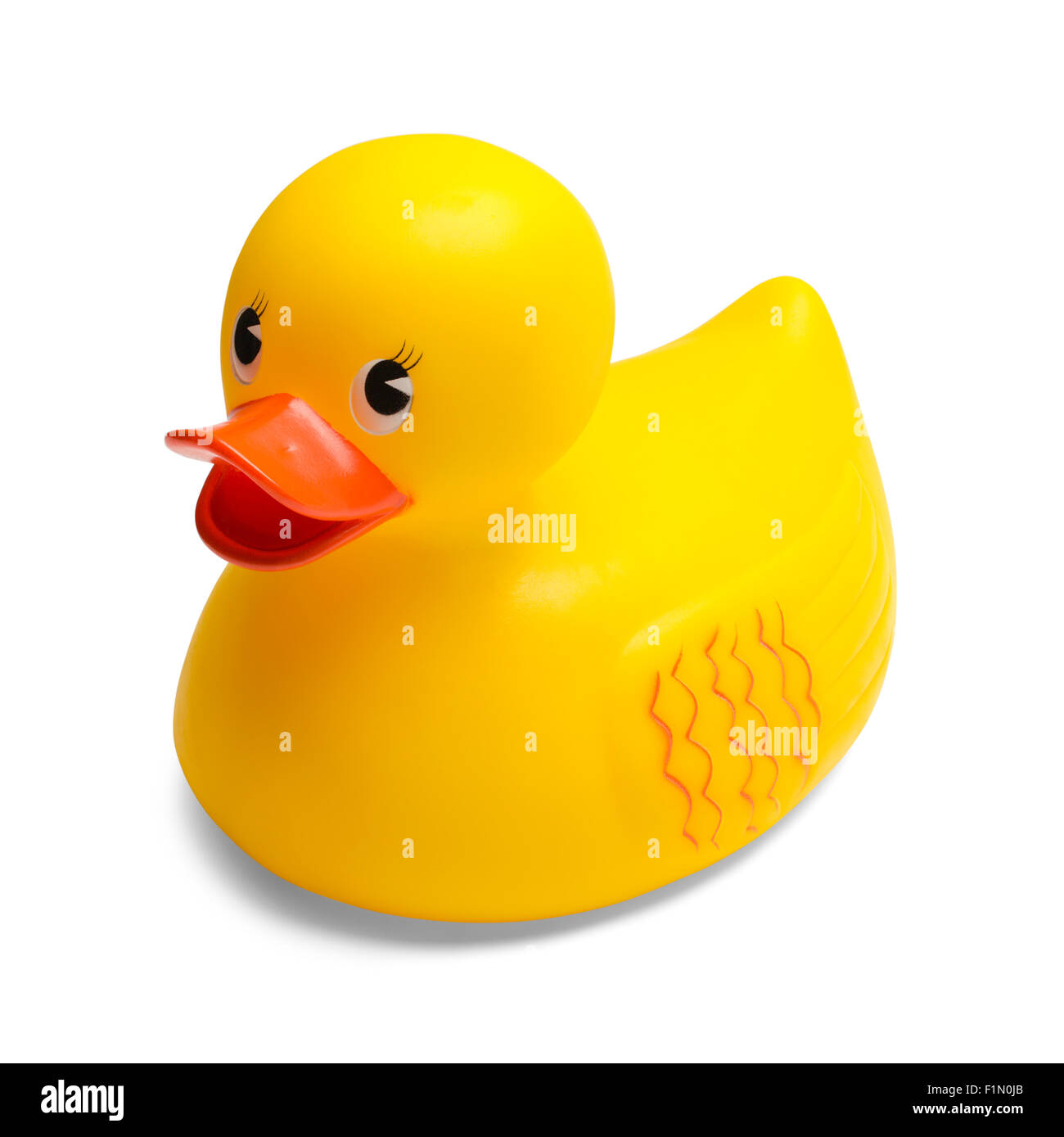 Jouet canard en caoutchouc jaune isolé sur fond blanc. Banque D'Images