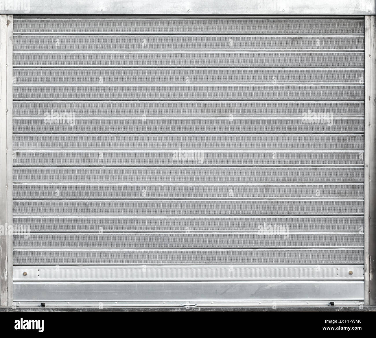 Porte de garage en métal gris avec volets roulants, texture d'arrière-plan Banque D'Images