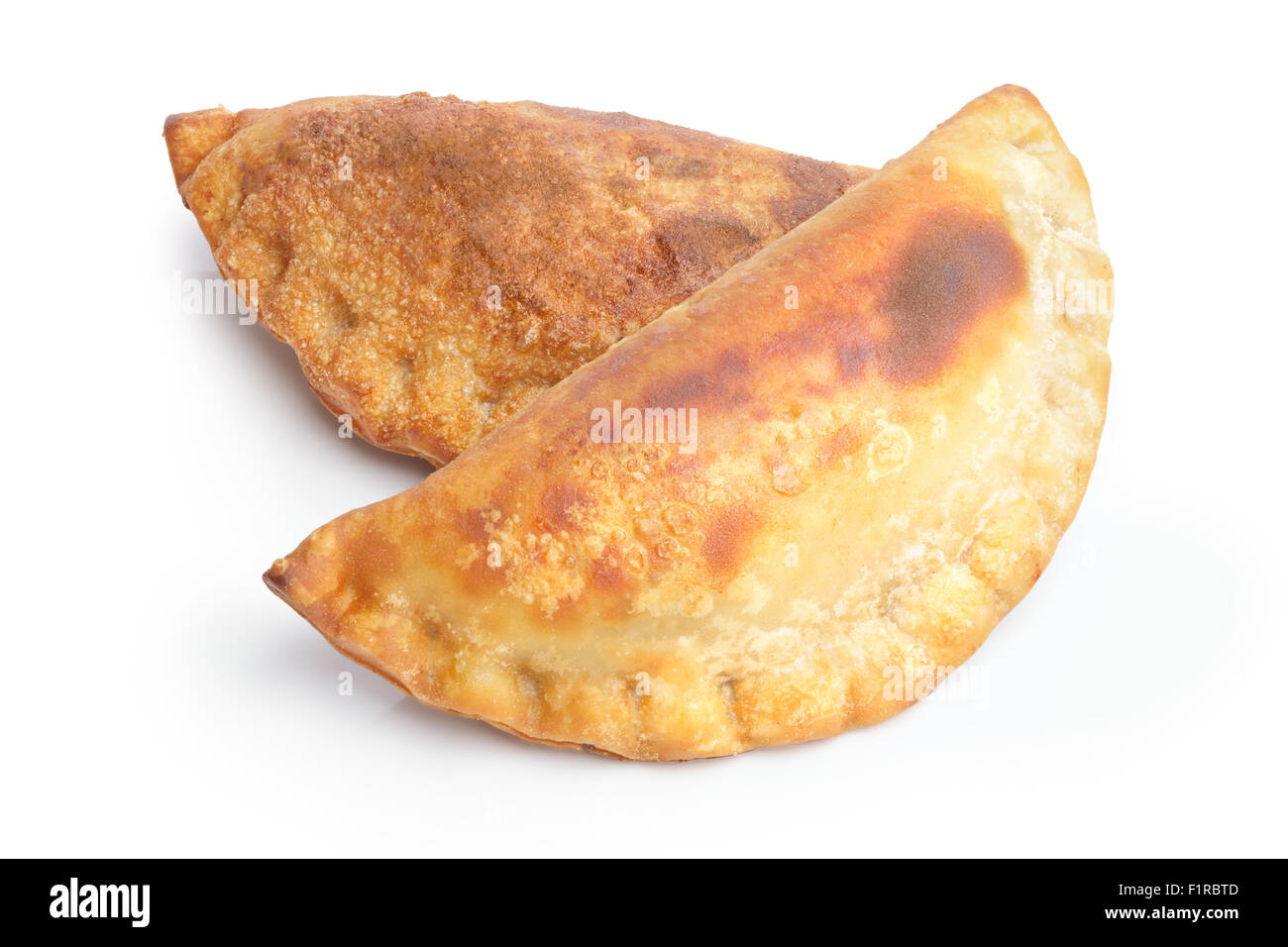 Salé isolés des empanadas. Savoury patty. Grande profondeur de champ Banque D'Images Salé isolés des empanadas. Savoury patty. Grande profondeur de champ Banque D'Images