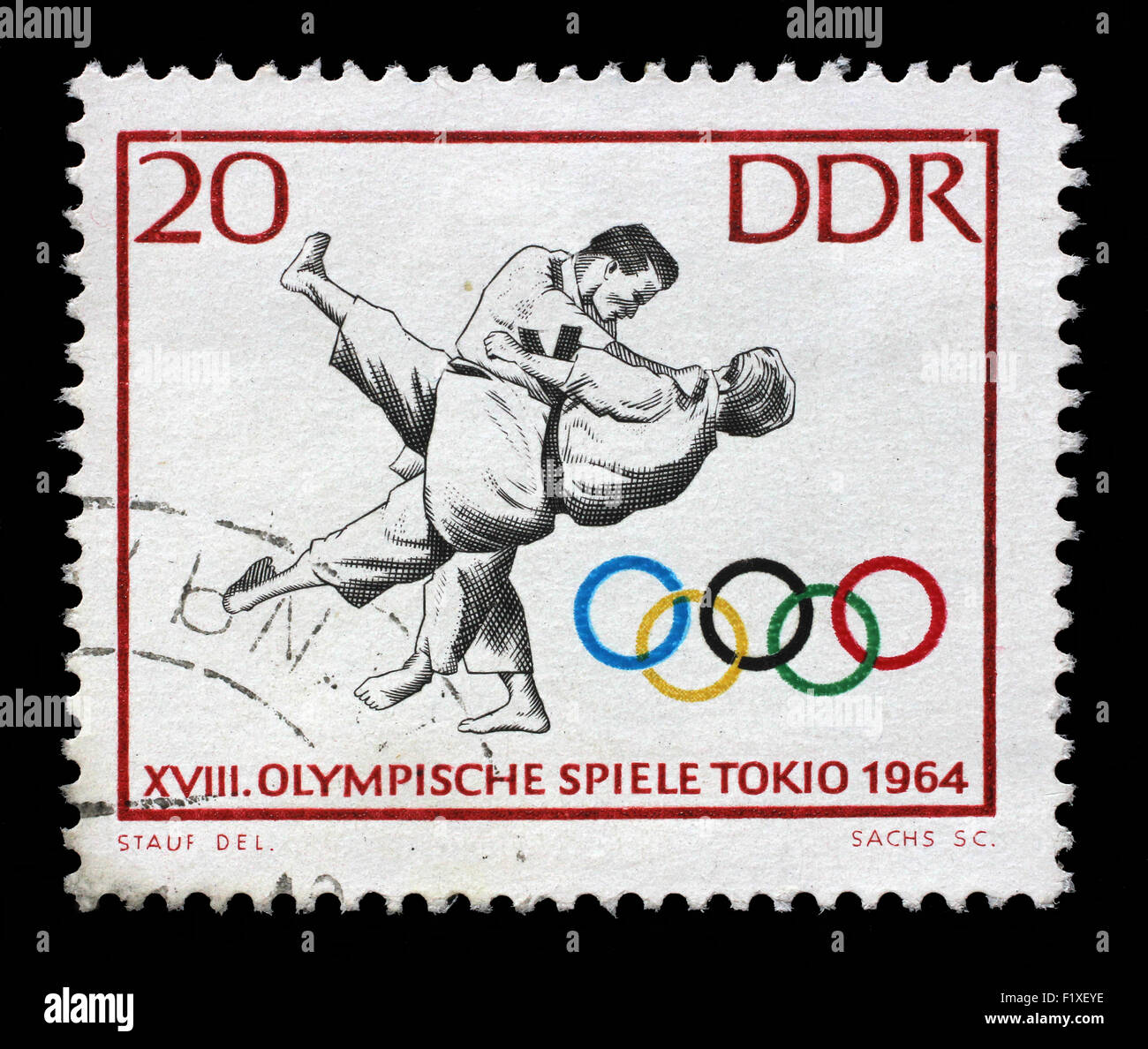 Timbres en RDA montre le Judo, 18e Jeux olympiques, Tokyo 64, vers 1964 Banque D'Images