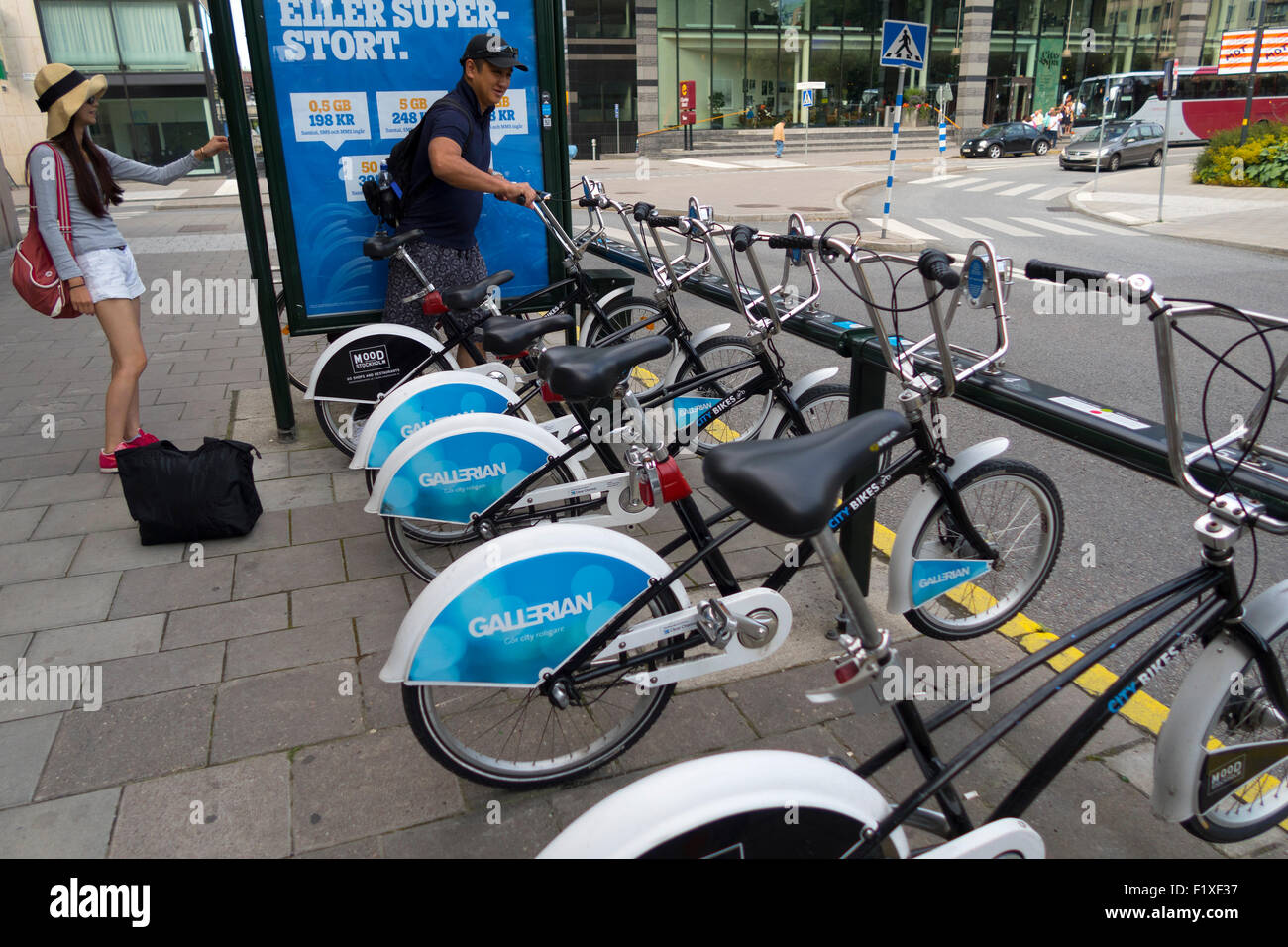 Un service de location de vélos dans la rue de Stockholm, Stockholm, Suède, Europe Banque D'Images