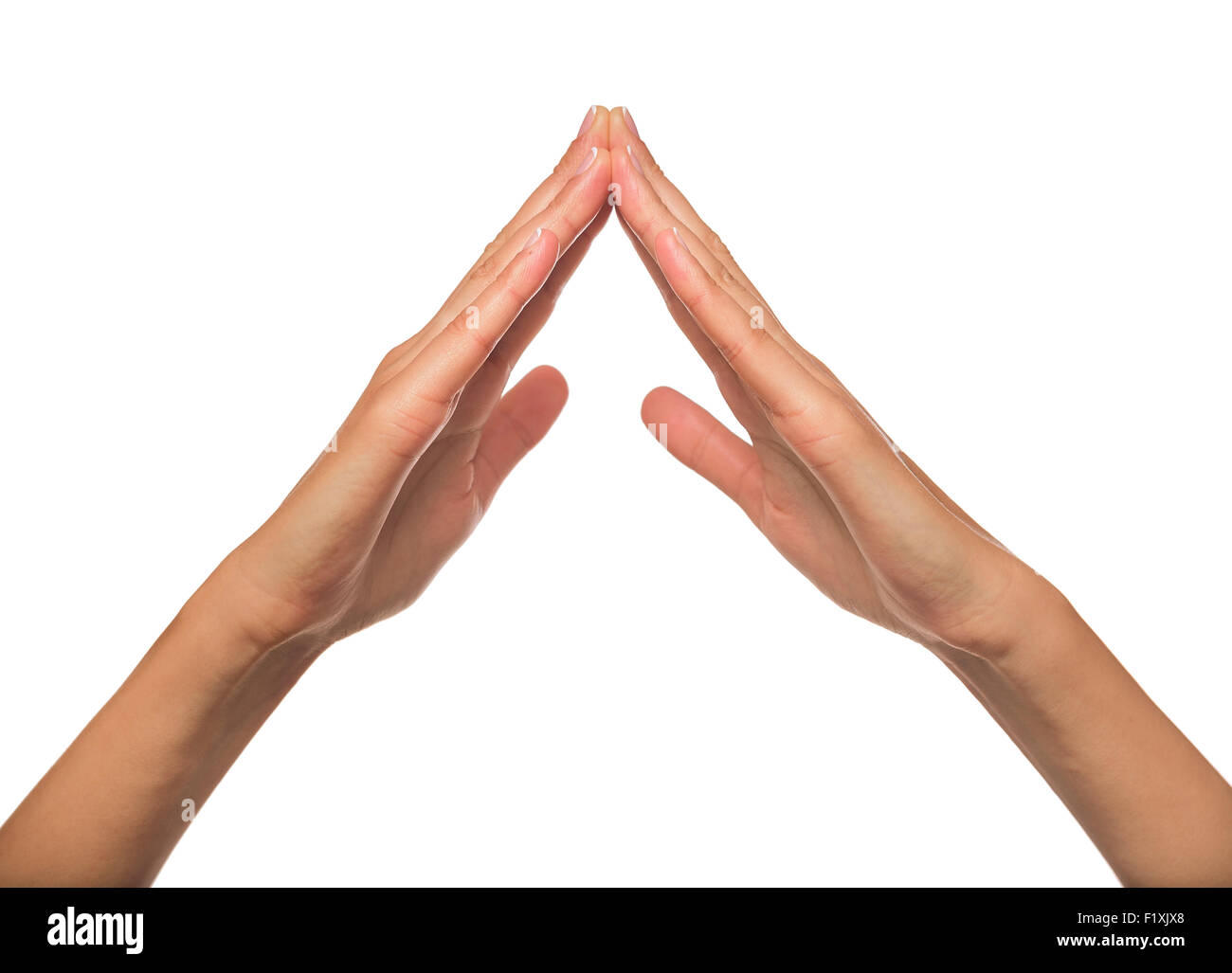 Les mains des femmes comme toit. Banque D'Images